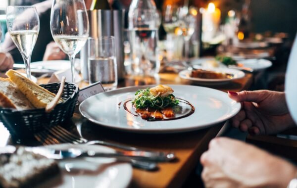 Couple enjoying romantic culinary honeymoon dinner experience