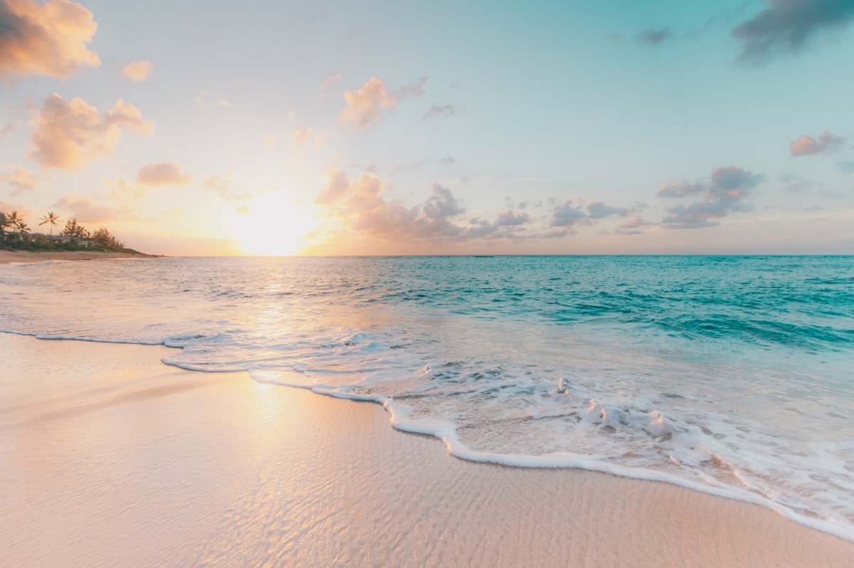 Couple enjoying double honeymoon beach getaway